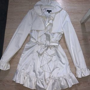 Bebe trench coat, with lots of ruffles